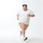 vecteezy ai generated overweight asian man running on white 37351284